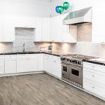 White kitchen cabinets in a newly remodeled kitchen. 