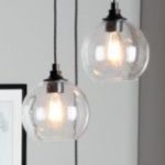 Two hanging light bulbs. 