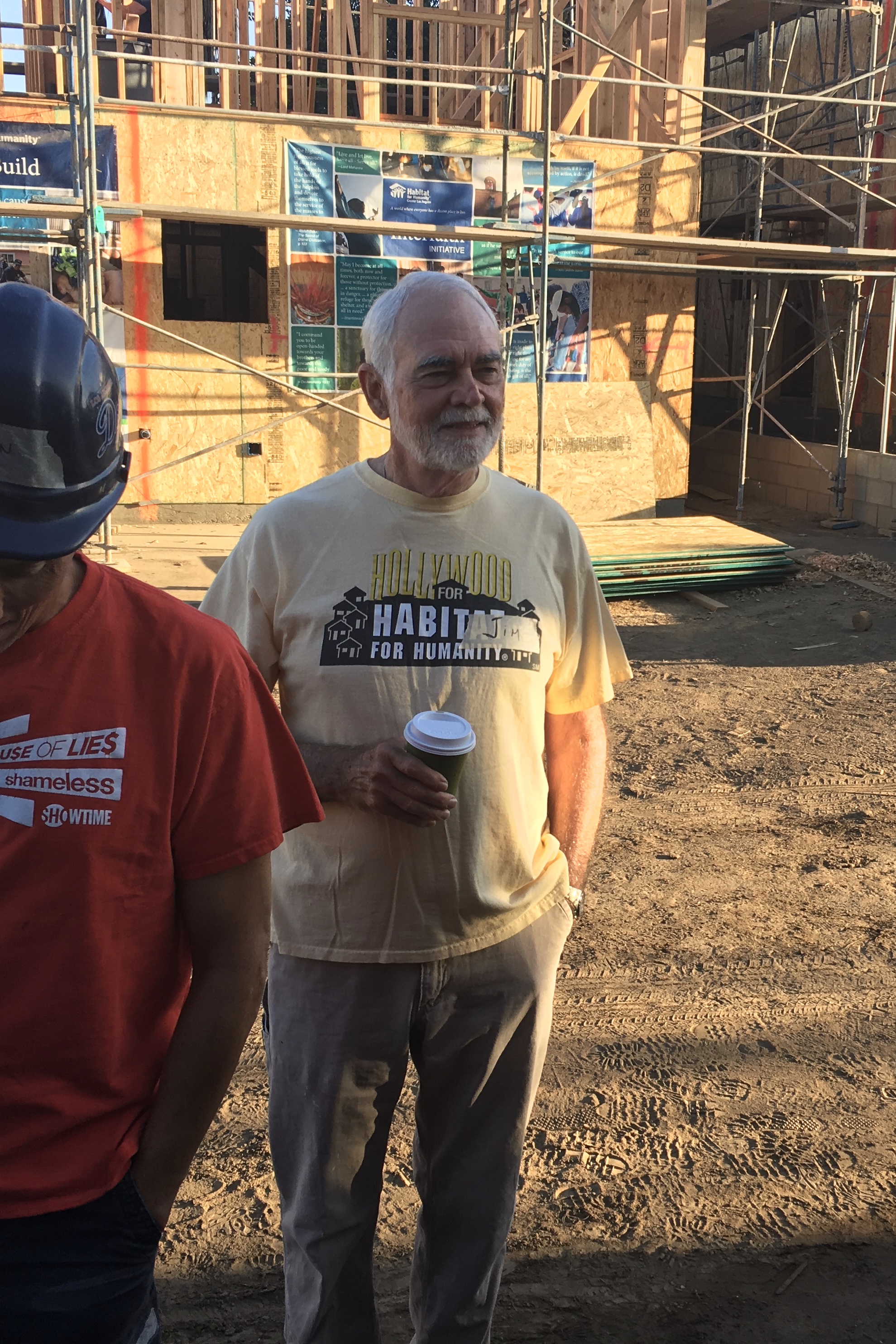 Jim, or Mr. C standing on the construction site.